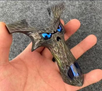 Collectible Titanium Alloy Slingshot with Engraved Pattern is a standout piece designed for those who appreciate both craftsmanship and character. Made from durable titanium alloy, it offers a solid premium feel, excellent strength, corrosion resistance, and long-lasting performance. The finely engraved pattern adds a distinctive visual identity, giving the slingshot a refined and collectible appearance that sets it apart from ordinary models. More than just an outdoor accessory, this slingshot is also a display-worthy piece for enthusiasts who value design, material quality, and uniqueness. Its balanced structure and comfortable grip make it appealing for handling and presentation alike, while the engraved detailing enhances its artistic and collector-oriented appeal. Whether you are adding it to your personal collection, choosing a memorable gift, or looking for a premium model with both function and style, this piece offers strong purchase value and lasting collectible charm.